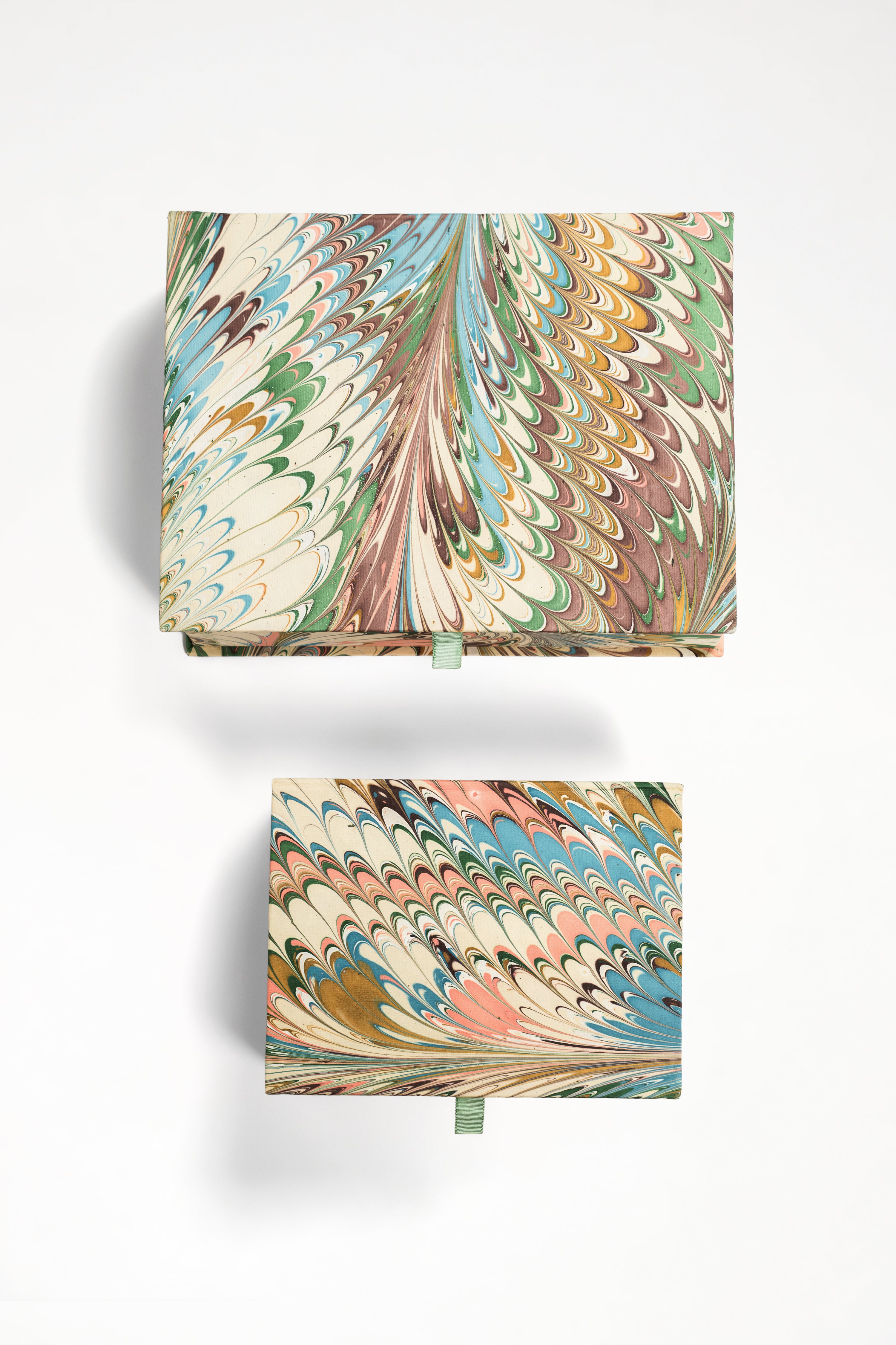Inner Child hand-marbled keepsake boxes in Flatiron feathers design
