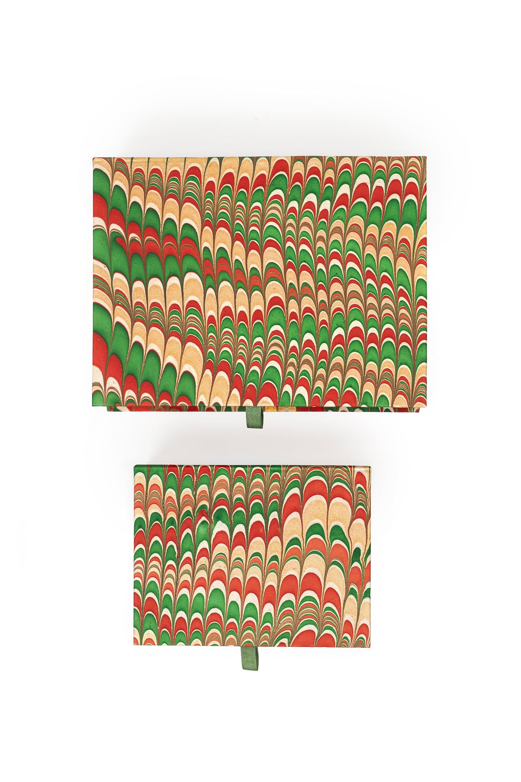 Inner Child hand-marbled keepsake box set in holiday jingle - two rectangular boxes shown from top view with festive marbling designs