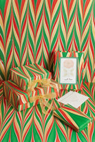 Gilded Holiday hand-marbled 4x6 frame with wrapped gifts on red, green and gold chevron marbled paper