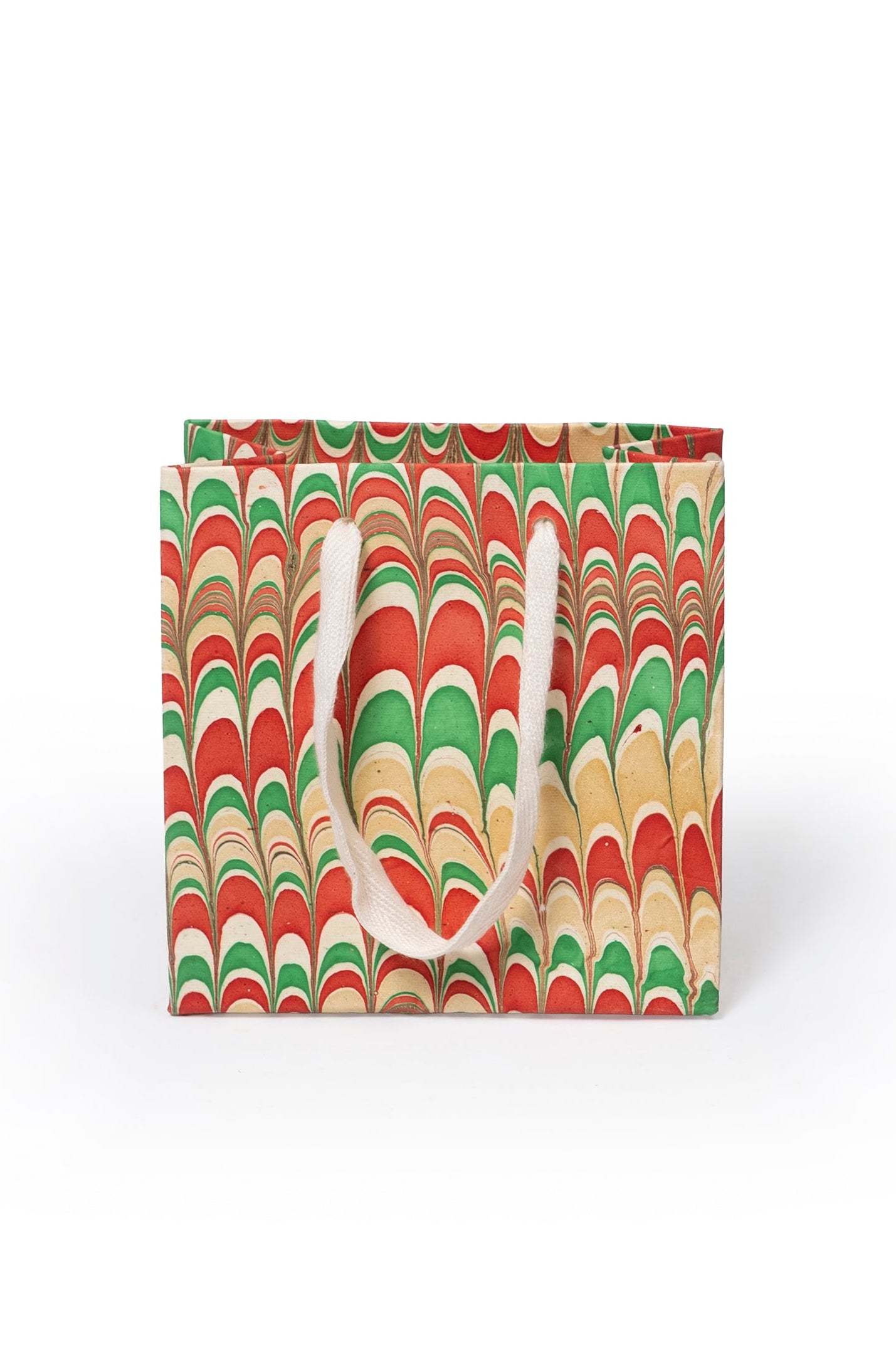 Small hand-marbled holiday gift bag with red-green patterns from Inner Child