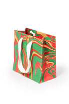 Inner Child holiday wave hand marbled gift bag with white rope handles