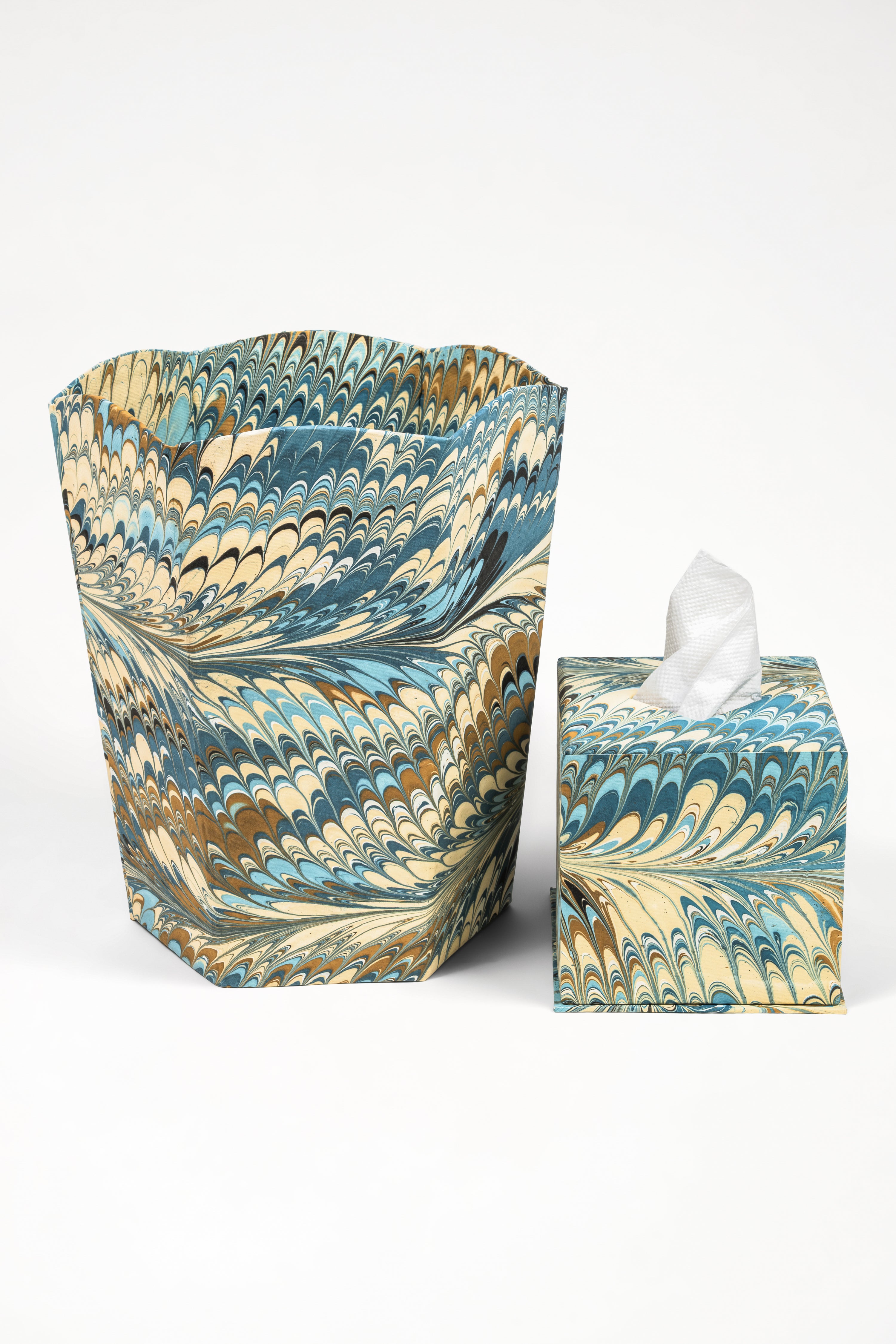 Matching hand-marbled tissue box and decorative container with blue, beige, brown designs