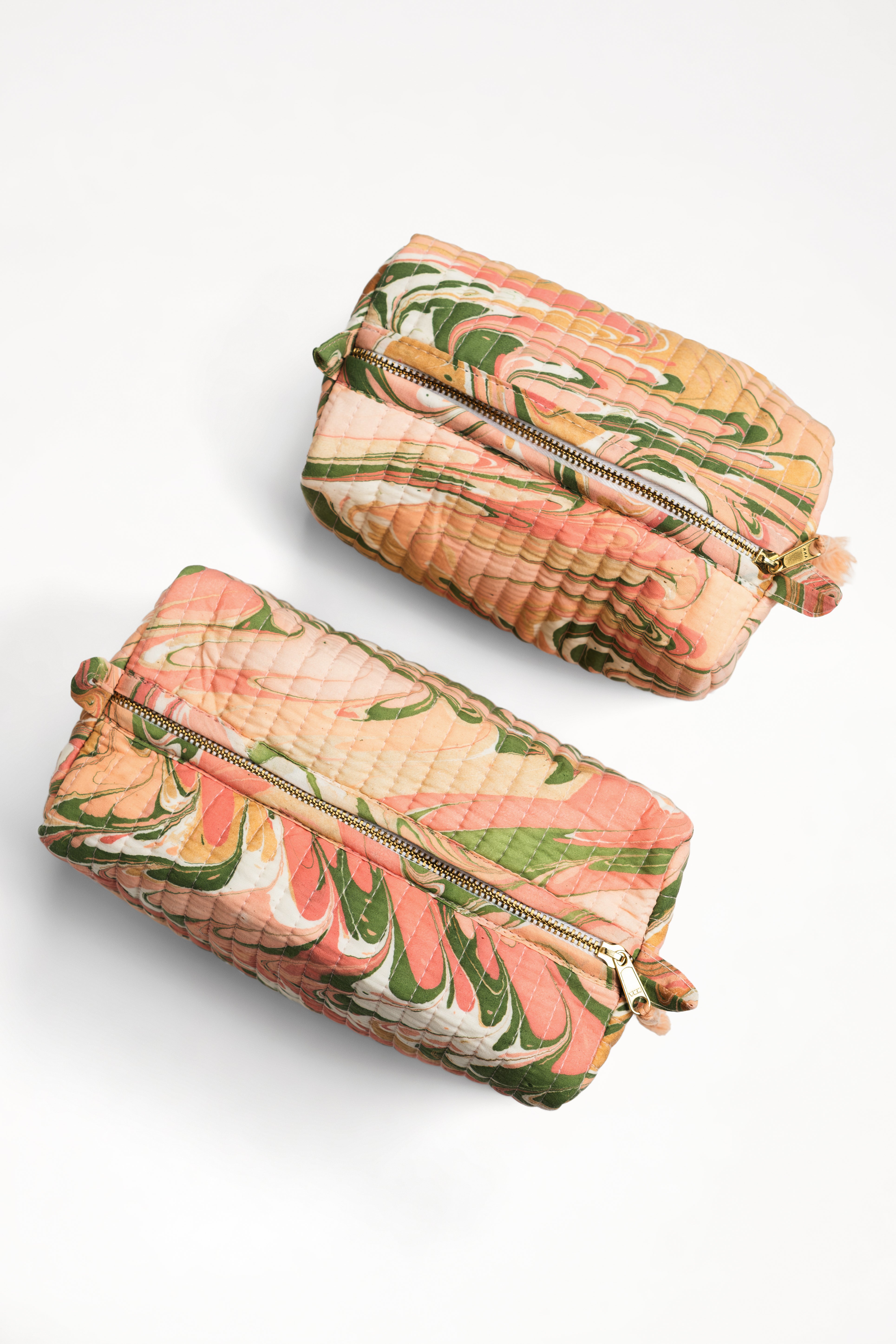 Peony Bloom hand-marbled cosmetic bags with pink, green, orange patterns