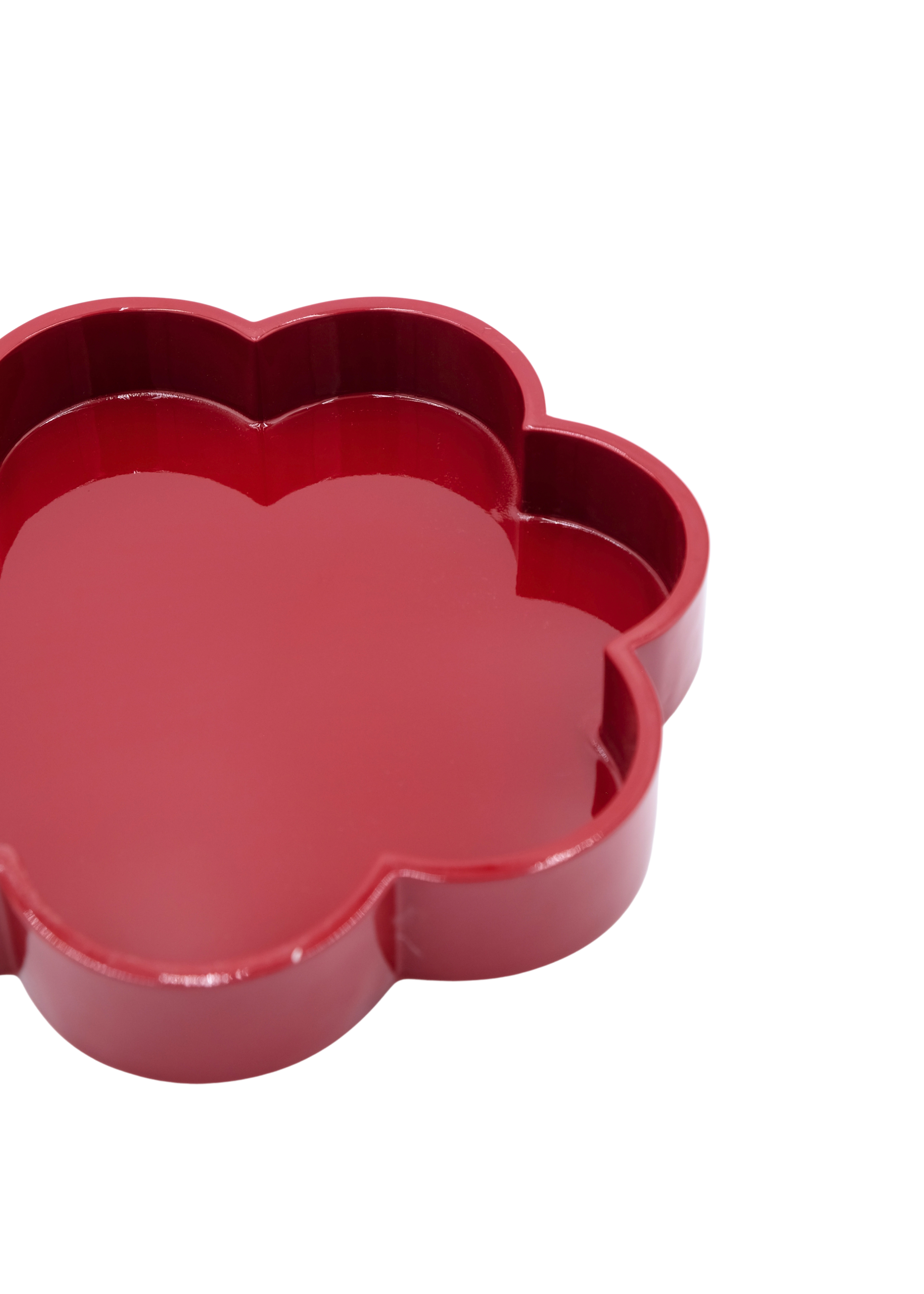 Close-up of red flower-shaped lacquerware tray