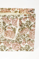 Cream blockprint gift bag with pink roses and brown leaves