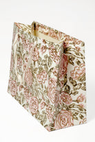 Cream blockprint gift bag with pink roses and brown leaves