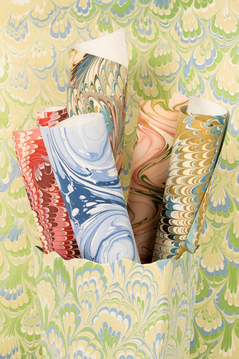 Hand-marbled ocean wave gift wrapping papers with vibrant colors and artistic patterns from Inner Child