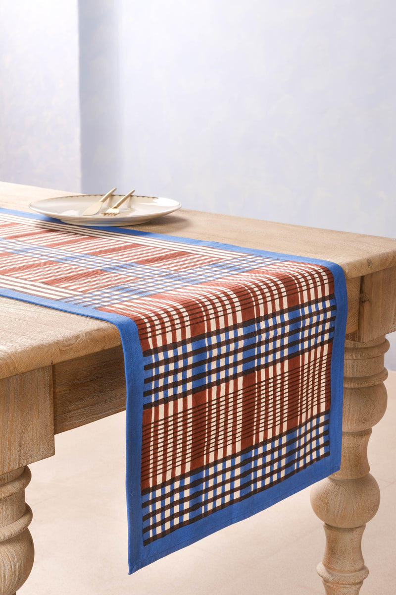 Brown and blue Shetland blockprint taberunner on wooden table
