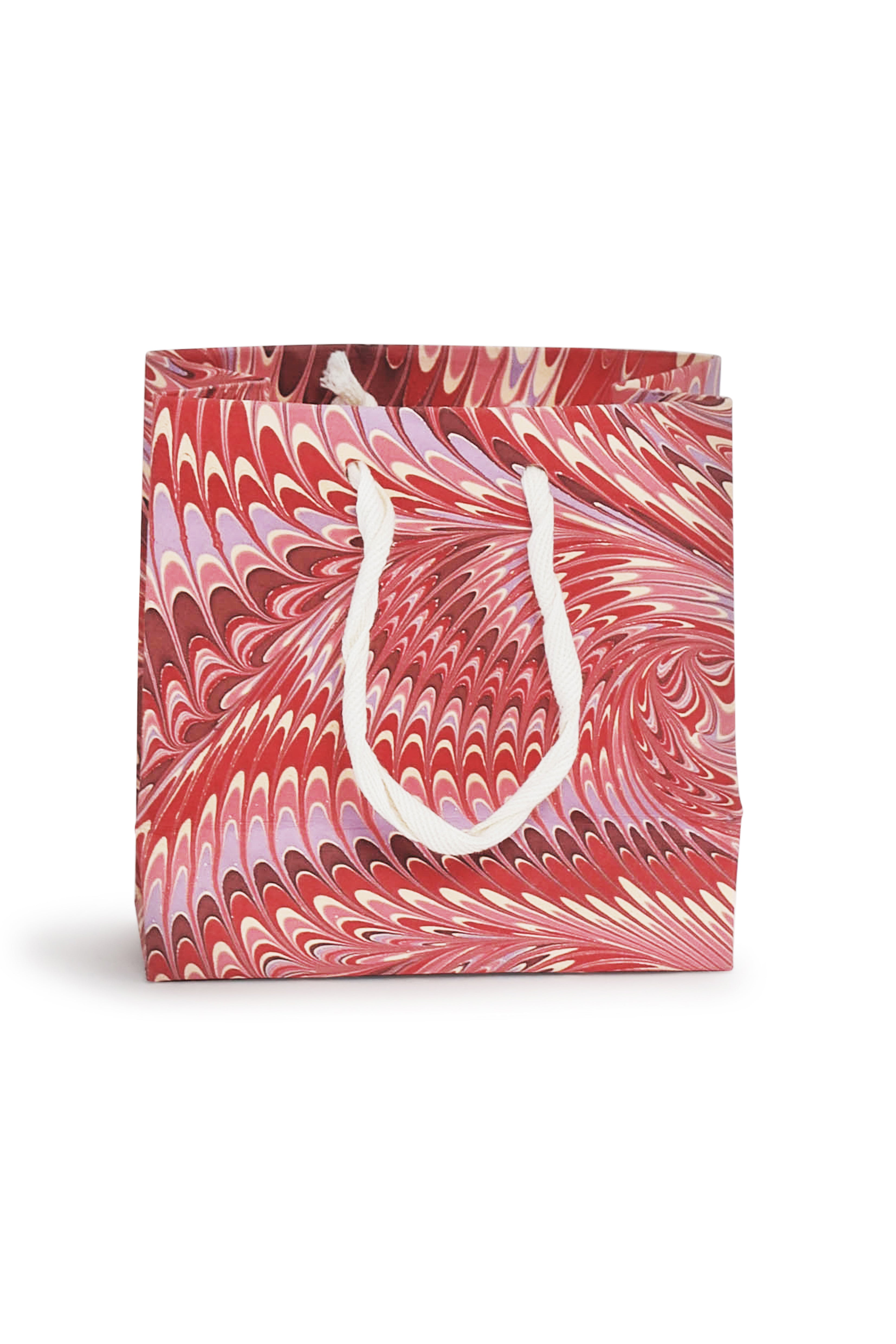 Small Florentine pink hand marbled gift bag with white rope handle from Inner Child