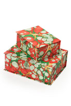 Hand-marbled keepsake box set in Christmas gems pattern with red, green, and white swirls, stacked in varying sizes.