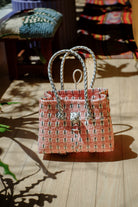 Inner Child Saigon Birkin recycled plastic bag light pink & grey with braided handles