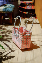 Inner Child Saigon Birkin recycled plastic bag light pink grey braided handles