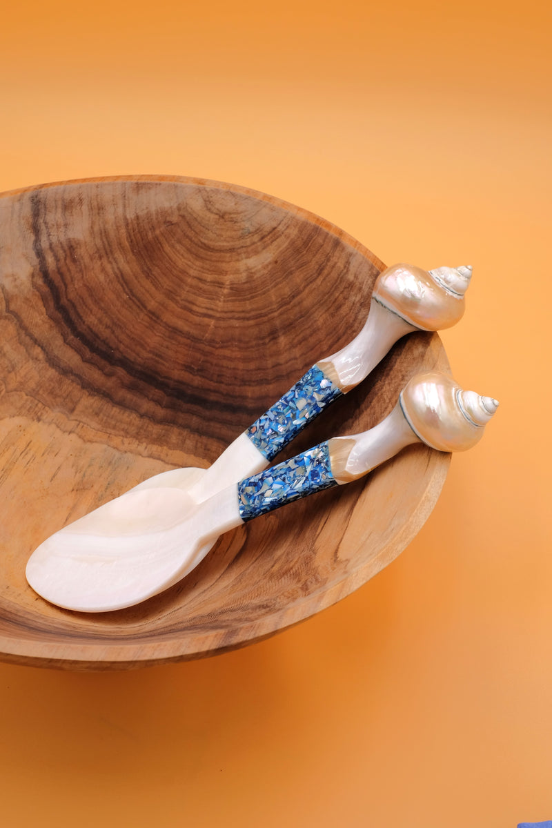 Inner Child blue seashell serving set displayed in wooden bowl