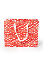 Medium red and white candy cane swirl hand marbled gift bag with white handles by Inner Child