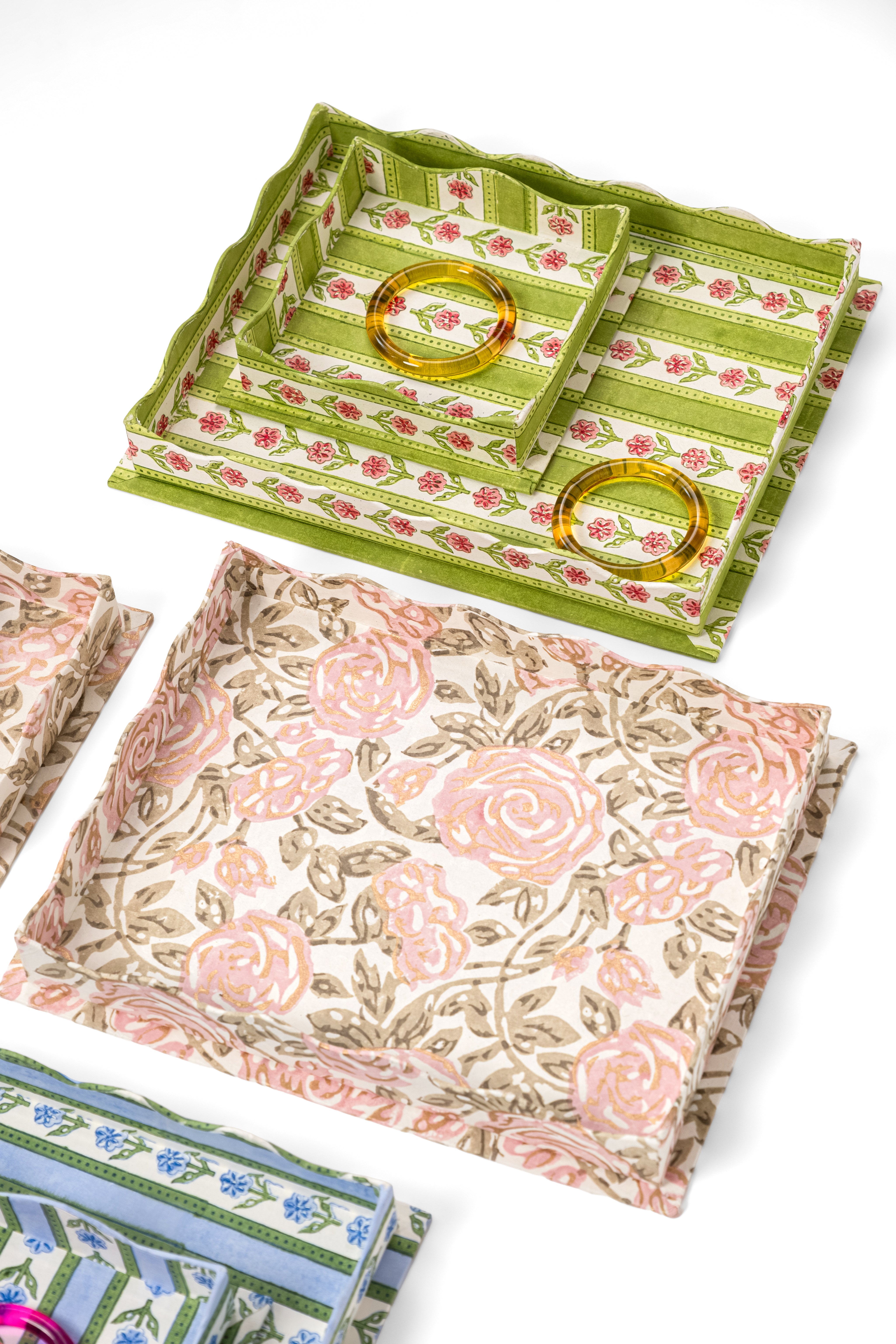 Multi-colored nesting scalloped blockprint trays with amber bangles from Inner Child